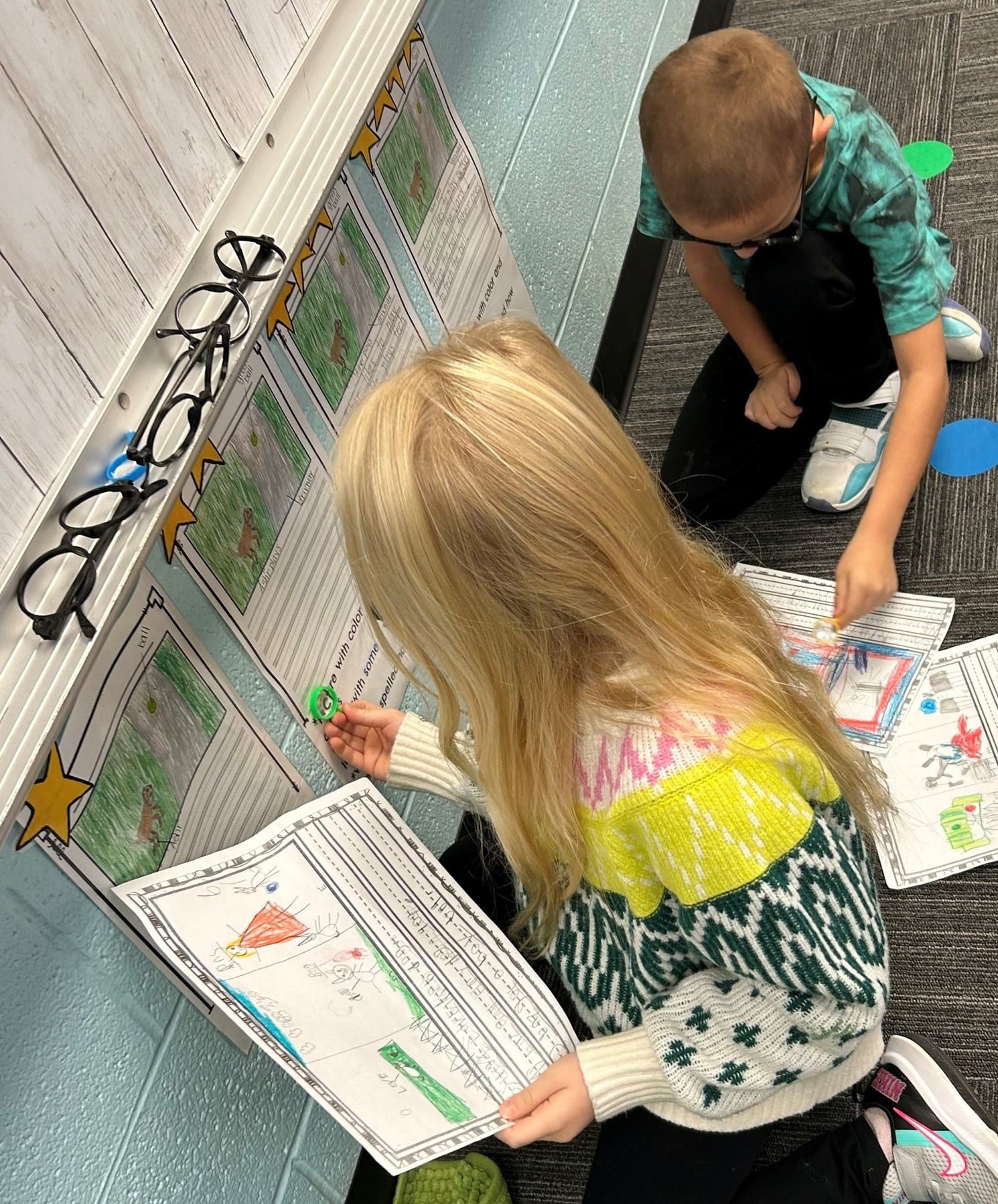 Primary students self-assessing - referring to a writing rubric