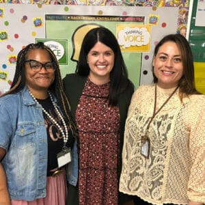 Teachers interacting with Smekens Education Literacy Consultant